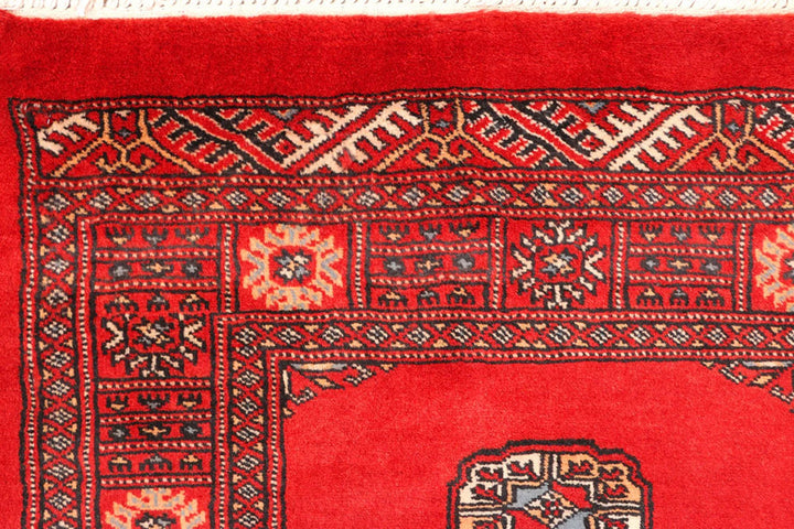 Red Pakistani Bokhara Rug 2' 7" x 11' 3" Hand-Knotted | No. QA86134
