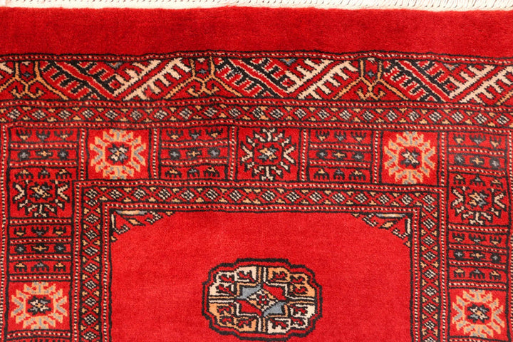 Red Pakistani Bokhara Rug 2' 7" x 11' 3" Hand-Knotted | No. QA86134