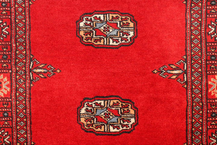 Red Pakistani Bokhara Rug 2' 7" x 11' 3" Hand-Knotted | No. QA86134