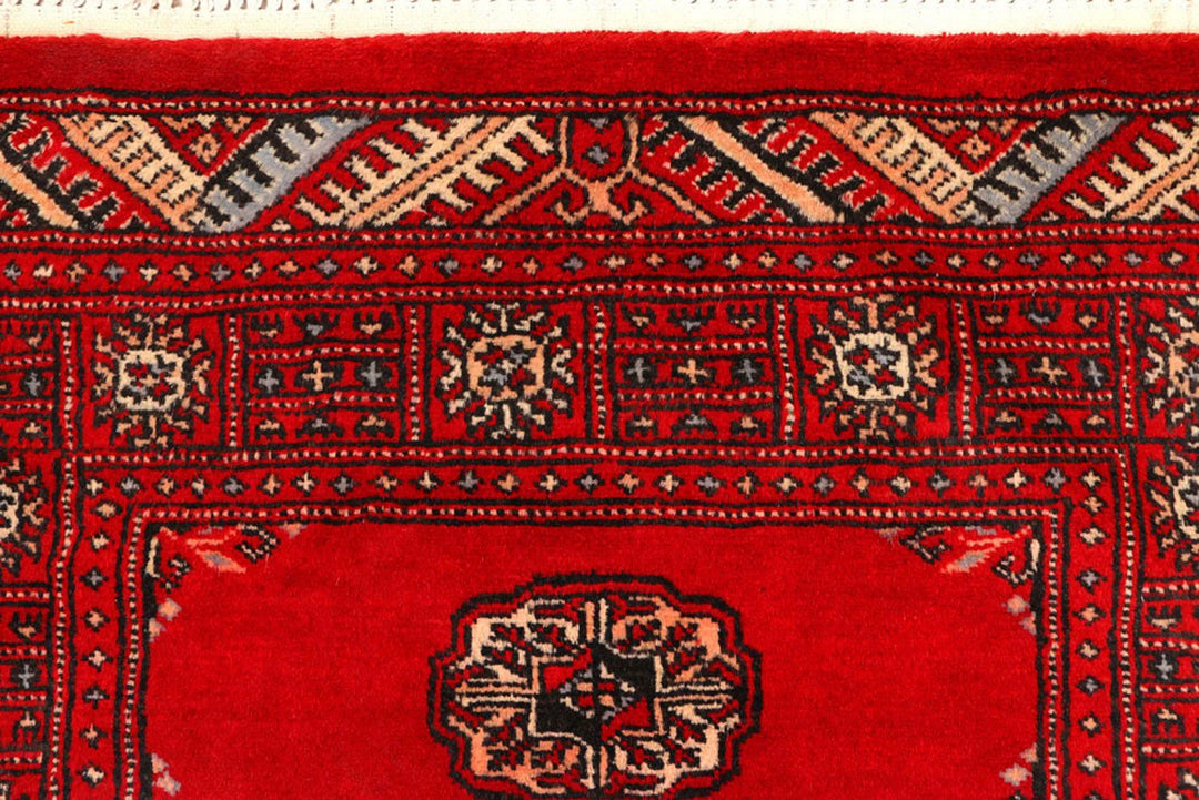 Red Pakistani Bokhara Rug 2' 7" x 9' Hand-Knotted | No. QA87293