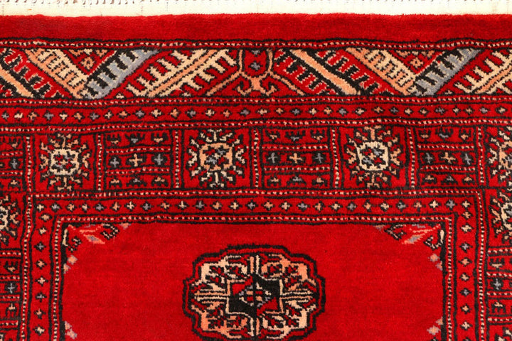 Red Pakistani Bokhara Rug 2' 7" x 9' Hand-Knotted | No. QA87293