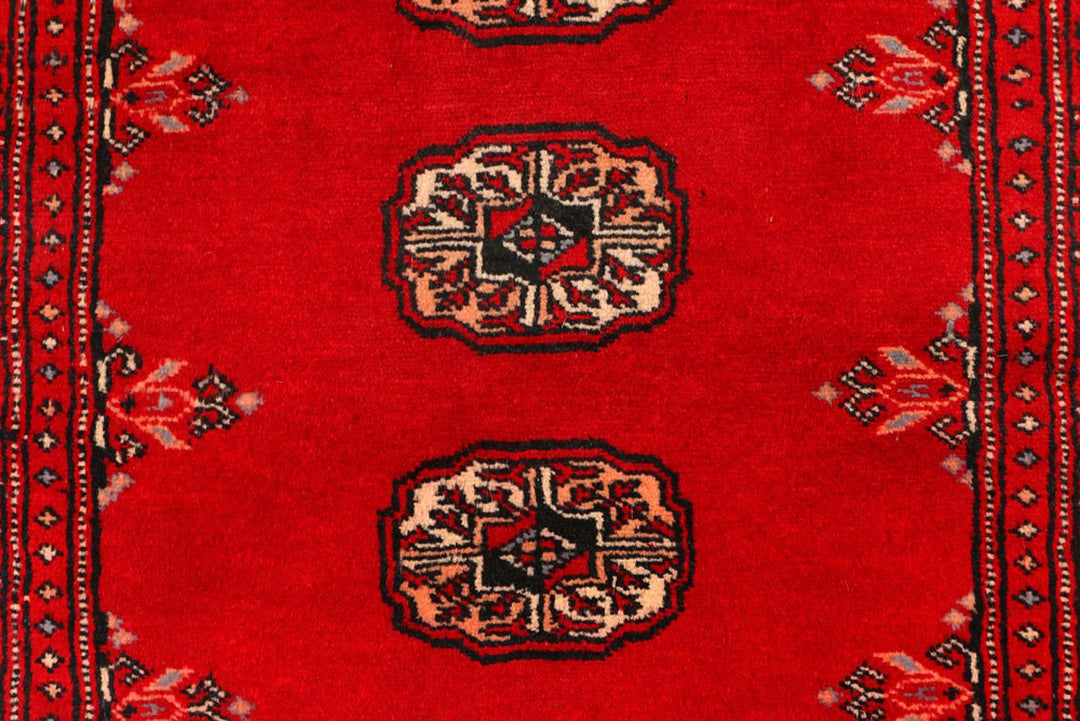 Red Pakistani Bokhara Rug 2' 7" x 9' Hand-Knotted | No. QA87293
