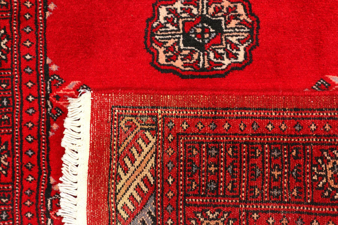 Red Pakistani Bokhara Rug 2' 7" x 9' Hand-Knotted | No. QA87293