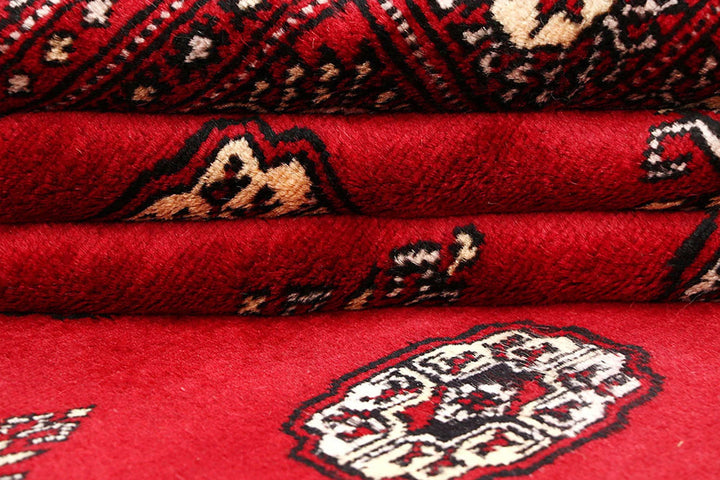 Crimson Pakistani Bokhara Rug 6' 1" x 9' 3" Hand-Knotted | No. QA88043