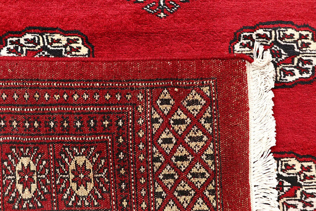Crimson Pakistani Bokhara Rug 6' 1" x 9' 3" Hand-Knotted | No. QA88043