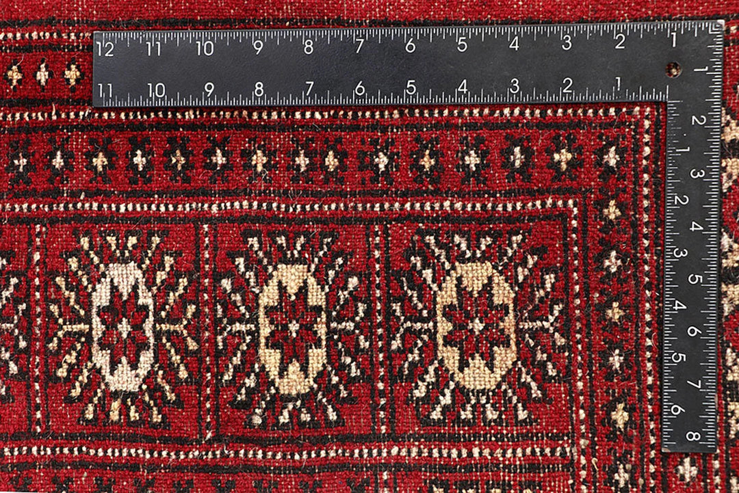 Crimson Pakistani Bokhara Rug 6' 1" x 9' 3" Hand-Knotted | No. QA88043