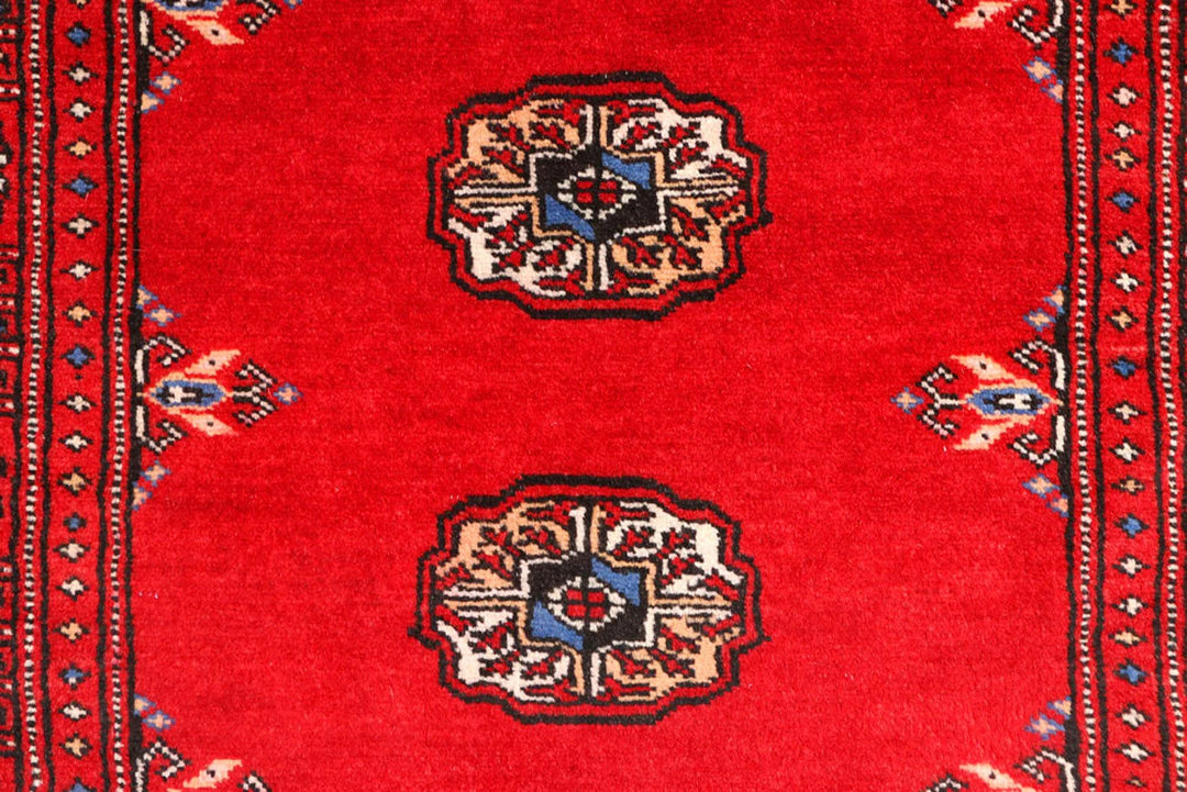 Red Pakistani Bokhara Rug 2' 8" x 9' 4" Hand-Knotted | No. QA88240