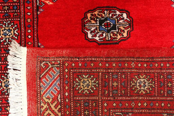 Red Pakistani Bokhara Rug 2' 8" x 9' 4" Hand-Knotted | No. QA88240