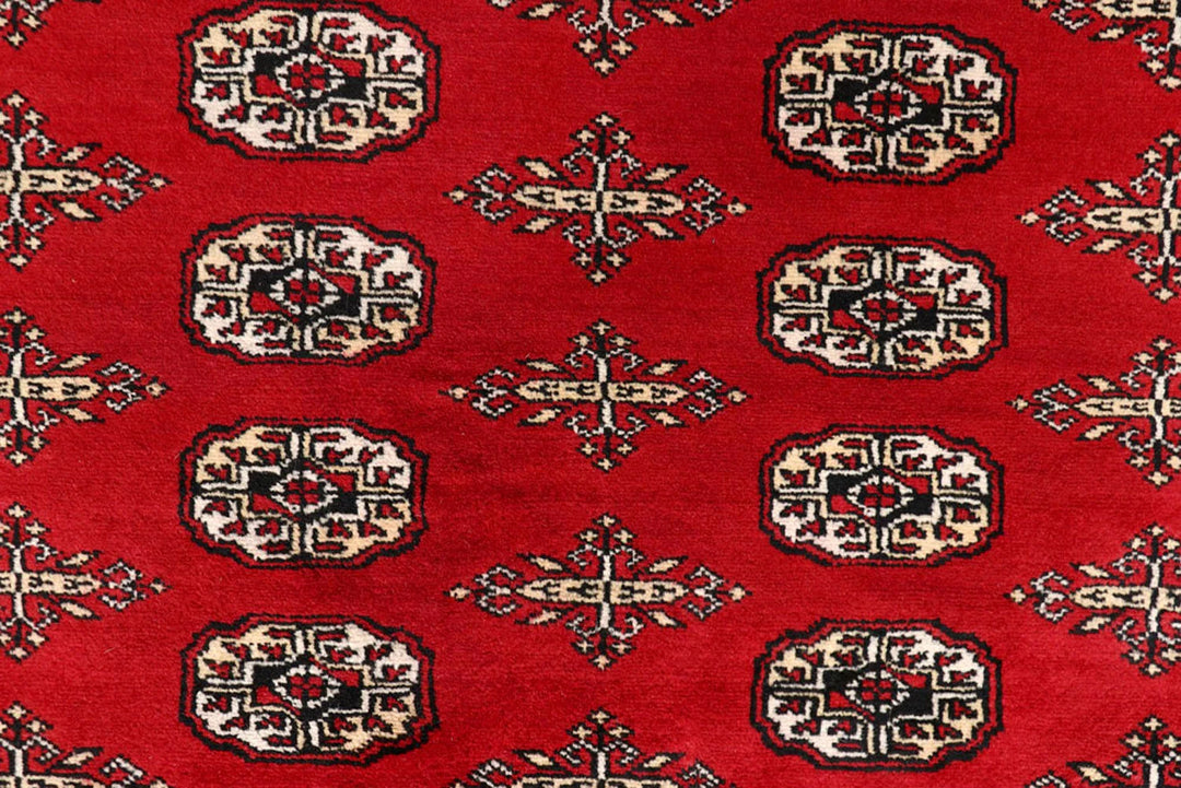 Red Pakistani Bokhara Rug 8' x 10' Hand-Knotted | No. QA88741
