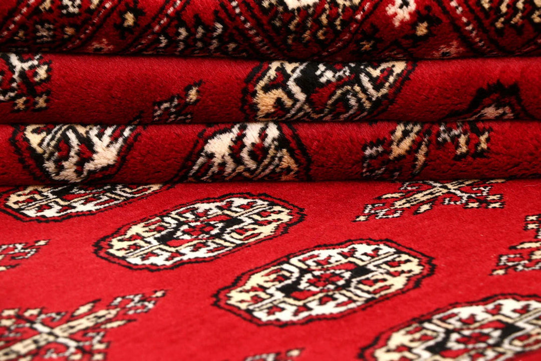 Red Pakistani Bokhara Rug 8' x 10' Hand-Knotted | No. QA88741