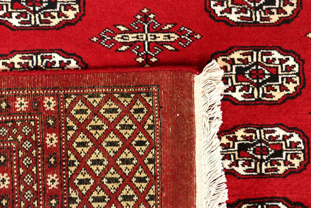 Red Pakistani Bokhara Rug 8' x 10' Hand-Knotted | No. QA88741
