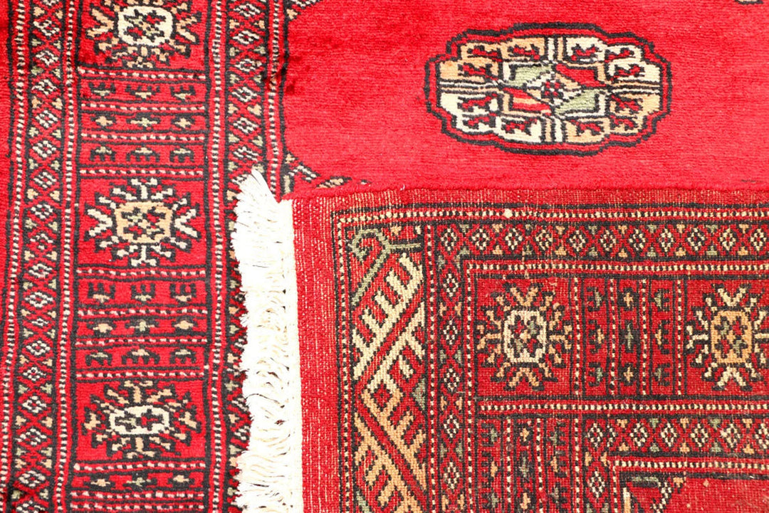 Dark Red Pakistani Bokhara Rug 2' 6" x 6' 3" Hand-Knotted | No. QA88750
