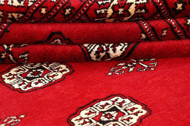 Red Pakistani Bokhara Rug 6' x 9'1" Hand-Knotted | No. QA89107