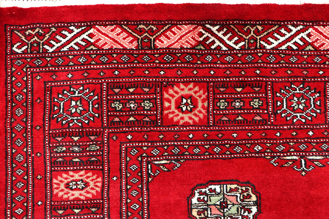 Red Pakistani Bokhara Rug 4' x 6'3" Hand-Knotted | No. QA89108