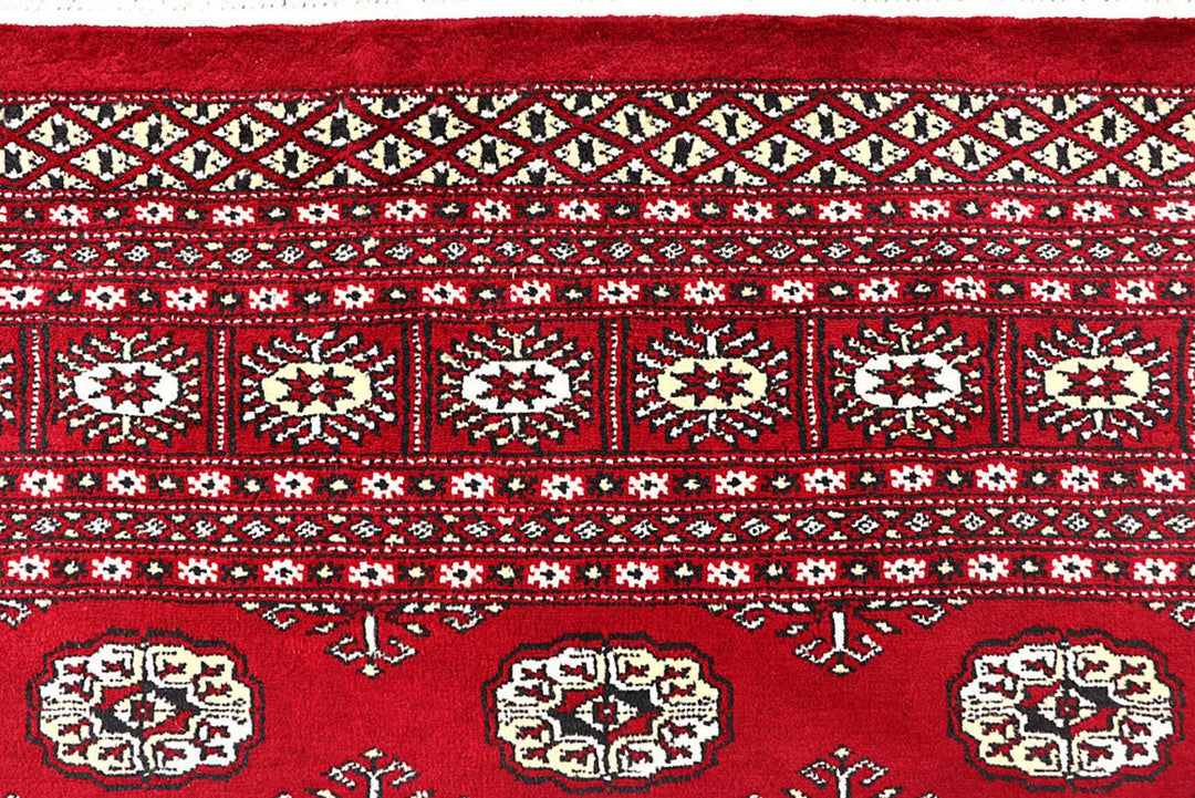Red Pakistani Bokhara Rug 6' 2" x 8' 10" Hand-Knotted | No. QA89109