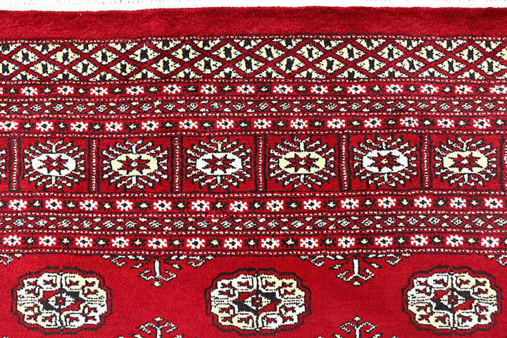 Red Pakistani Bokhara Rug 6' 2" x 8' 10" Hand-Knotted | No. QA89109