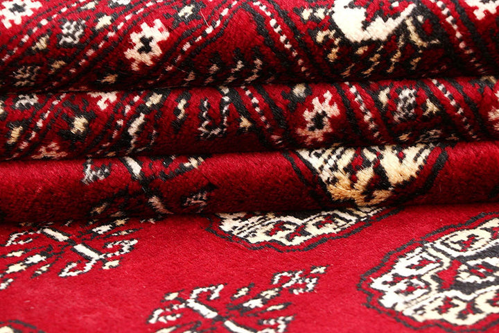 Red Pakistani Bokhara Rug 6' 2" x 8' 10" Hand-Knotted | No. QA89109