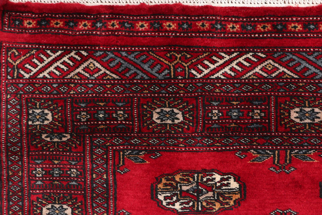 Dark Red Pakistani Bokhara Rug 3' 1" x 4' 11" Hand-Knotted | No. QA90042
