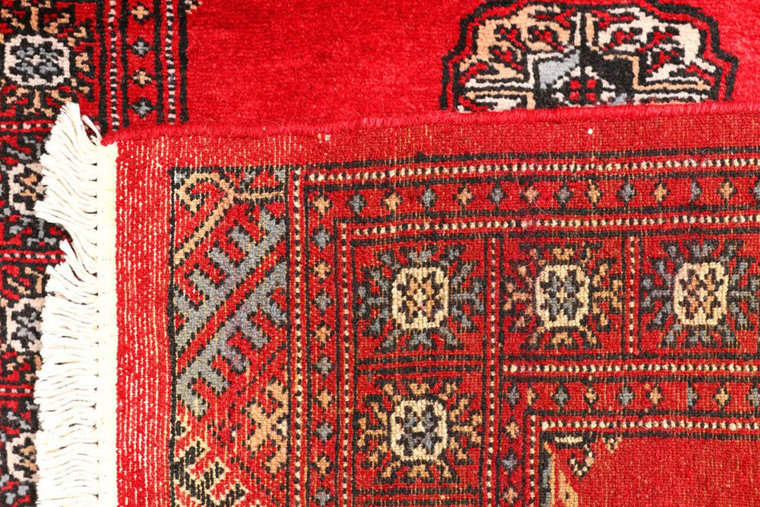 Red Pakistani Bokhara Rug 2' 6" x 9' 3" Hand-Knotted | No. QA90142