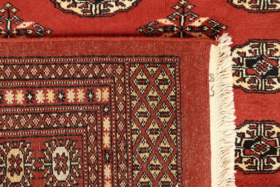 Orange Red Pakistani Bokhara Rug 6' 1" x 9' 1" Hand-Knotted | No. QA90234