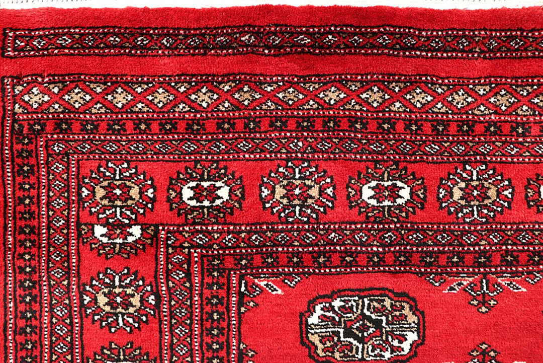 Firebrick Red Pakistani Bokhara Rug 5' 1" x 8' 6" Hand-Knotted | No. QA90462