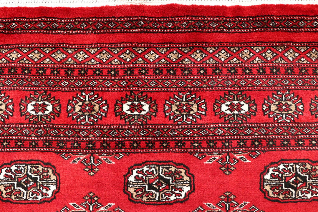Firebrick Red Pakistani Bokhara Rug 5' 1" x 8' 6" Hand-Knotted | No. QA90462