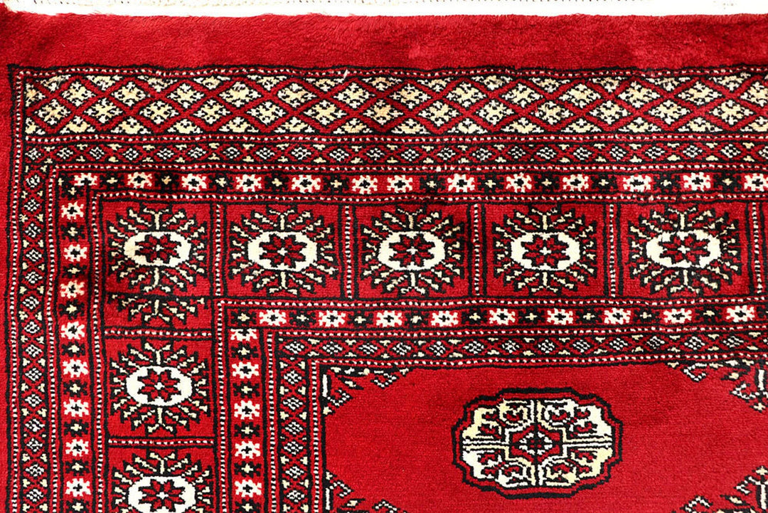 Red Pakistani Bokhara Rug 6' x 8'4" Hand-Knotted | No. QA91610