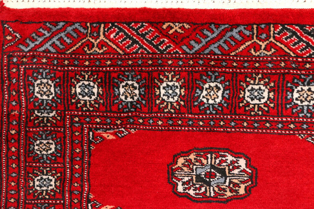 Red Pakistani Bokhara Rug 2' 6" x 9' 1" Hand-Knotted | No. QA91626