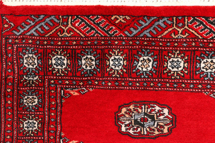 Red Pakistani Bokhara Rug 2' 6" x 9' 1" Hand-Knotted | No. QA91626
