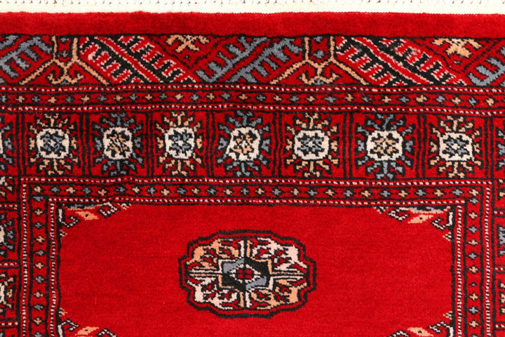 Red Pakistani Bokhara Rug 2' 6" x 9' 1" Hand-Knotted | No. QA91626