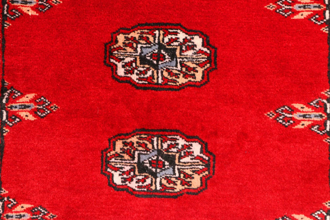 Red Pakistani Bokhara Rug 2' 6" x 9' 1" Hand-Knotted | No. QA91626