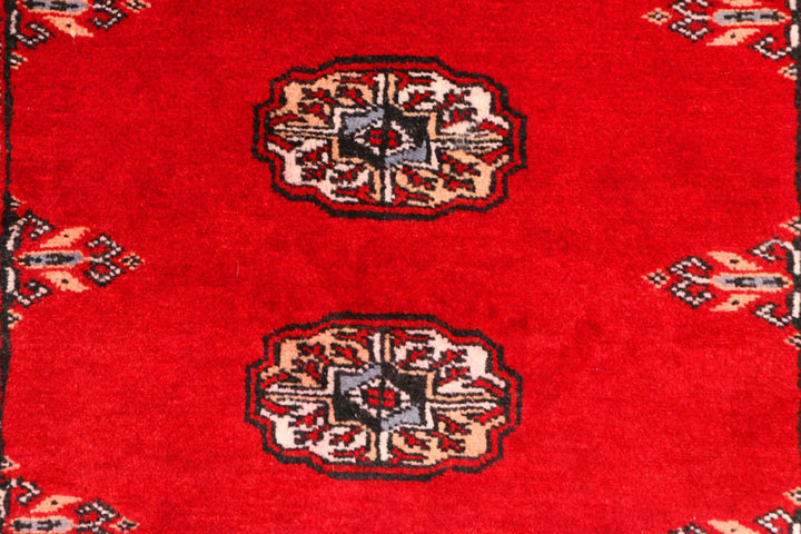 Red Pakistani Bokhara Rug 2' 6" x 9' 1" Hand-Knotted | No. QA91626