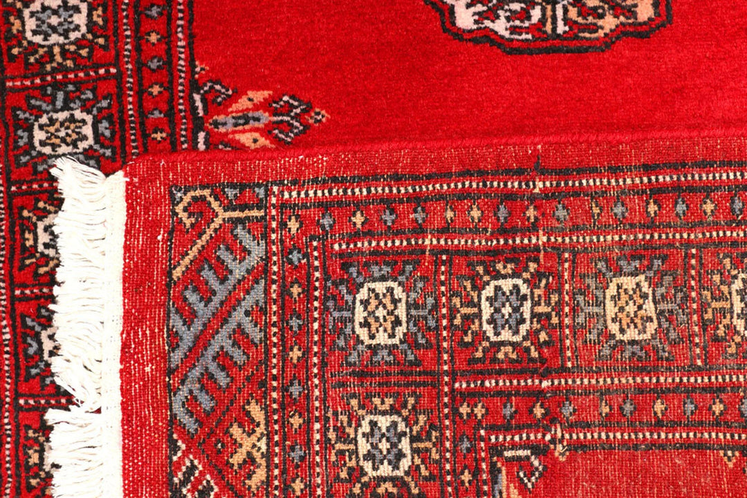 Red Pakistani Bokhara Rug 2' 6" x 9' 1" Hand-Knotted | No. QA91626