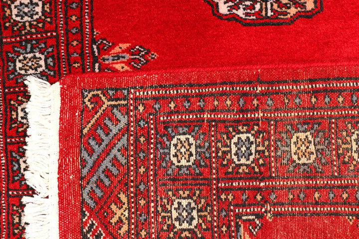 Red Pakistani Bokhara Rug 2' 6" x 9' 1" Hand-Knotted | No. QA91626