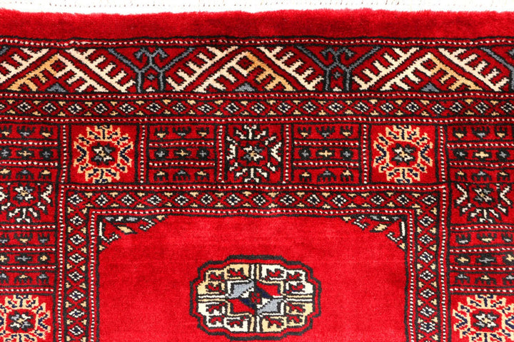 Red Pakistani Bokhara Rug 2' 7" x 9' 5" Hand-Knotted | No. QA92268
