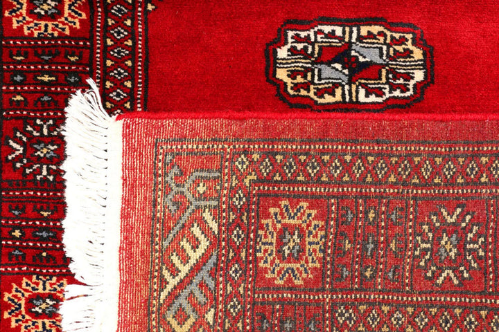 Red Pakistani Bokhara Rug 2' 7" x 9' 5" Hand-Knotted | No. QA92268
