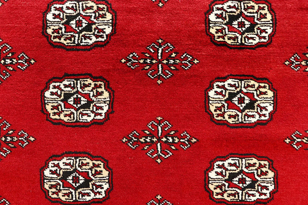 Red Bokhara Rug 6' 1" x 9' 3" Hand-Knotted | No. QA93049