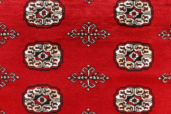 Red Bokhara Rug 6' 1" x 9' 3" Hand-Knotted | No. QA93049