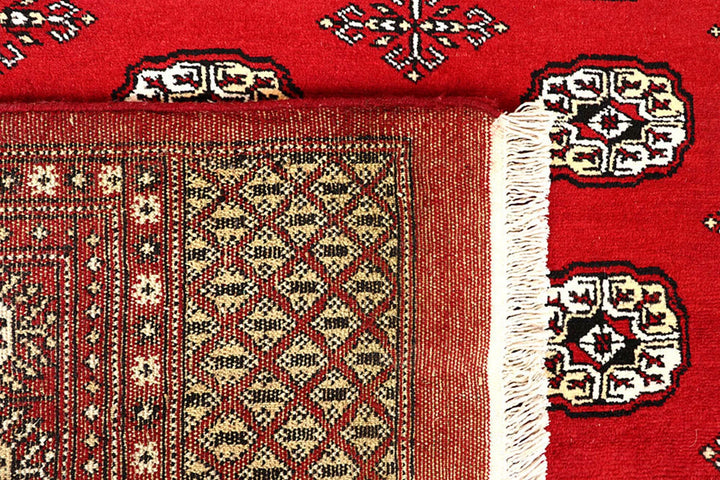 Red Bokhara Rug 6' 1" x 9' 3" Hand-Knotted | No. QA93049