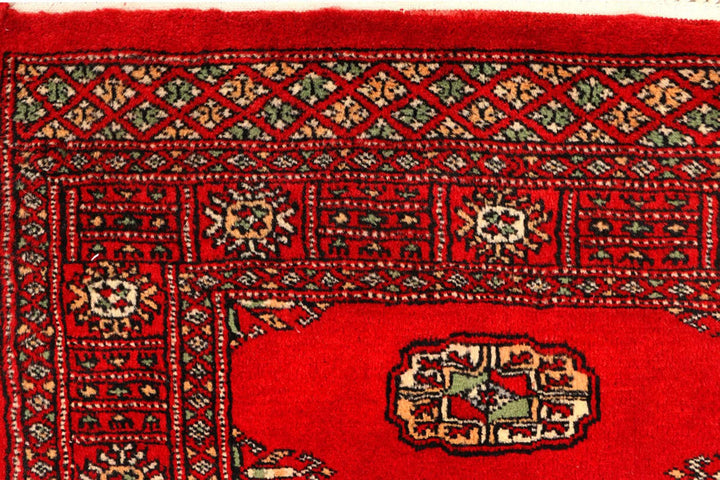 Red Pakistani Bokhara Rug 2' 7" x 9' 5" Hand-Knotted | No. QA93872