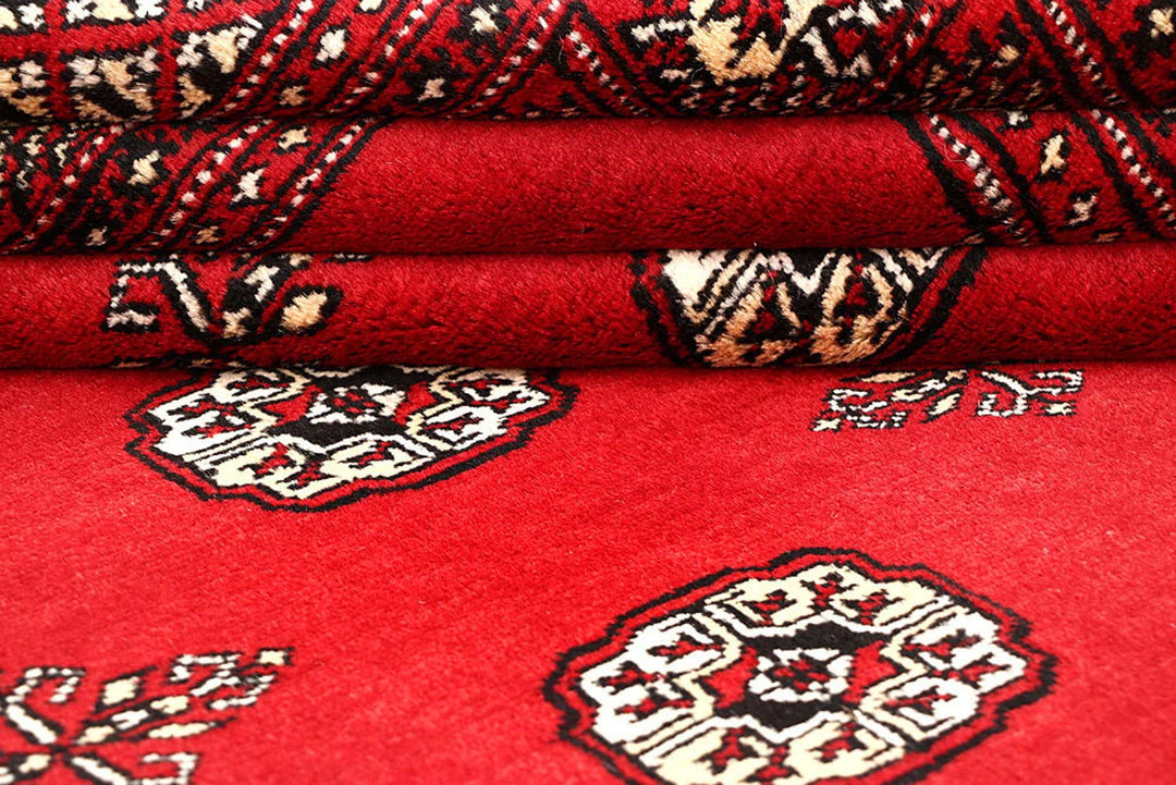 Red Pakistani Bokhara Rug 6' x 9'4" Hand-Knotted | No. QA94259