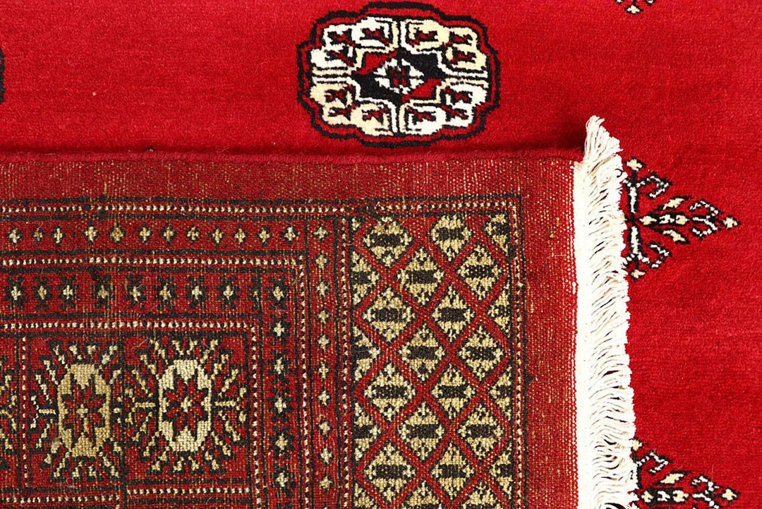 Red Pakistani Bokhara Rug 6' x 9'4" Hand-Knotted | No. QA94259