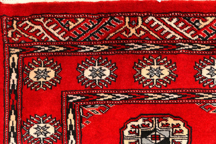 Red Pakistani Bokhara Rug 2' 7" x 9' 9" Hand-Knotted | No. QA95162