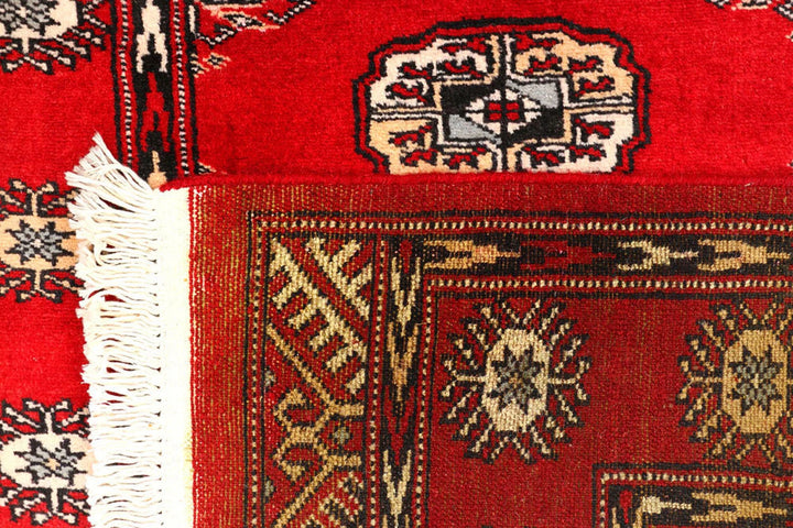 Red Pakistani Bokhara Rug 2' 7" x 9' 9" Hand-Knotted | No. QA95162