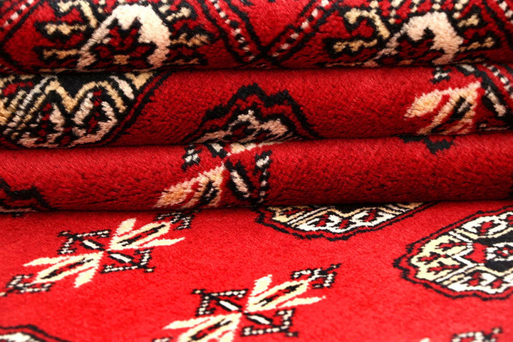 Red Pakistani Bokhara Rug 6' 2" x 9' 1" Hand-Knotted | No. QA95325