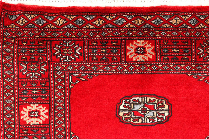 Red Pakistani Bokhara Rug 2' 7" x 9' 1" Hand-Knotted | No. QA95500