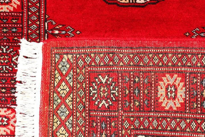 Red Pakistani Bokhara Rug 2' 7" x 9' 1" Hand-Knotted | No. QA95500