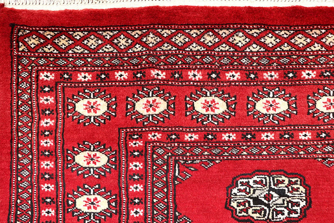 Red Pakistani Bokhara Rug 5' 2" x 8' 4" Hand-Knotted | No. QA97440