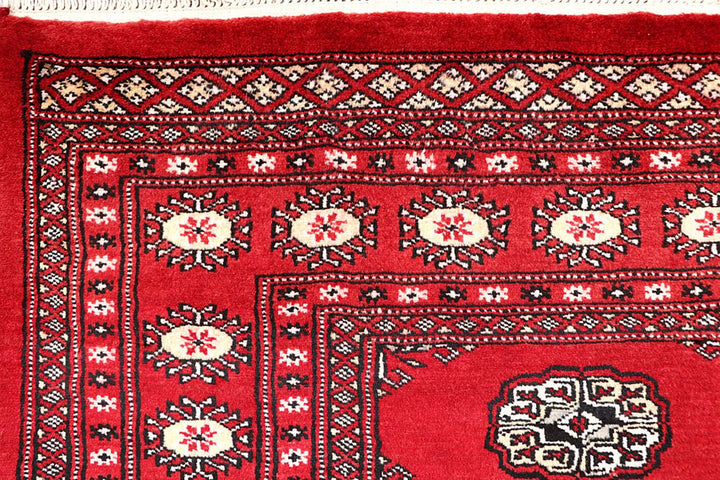 Red Pakistani Bokhara Rug 5' 2" x 8' 4" Hand-Knotted | No. QA97440