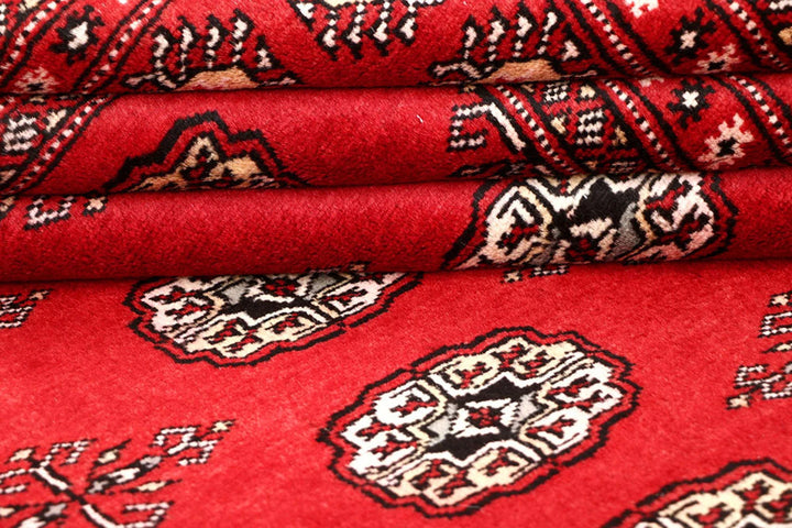 Red Pakistani Bokhara Rug 5' 2" x 8' 4" Hand-Knotted | No. QA97440